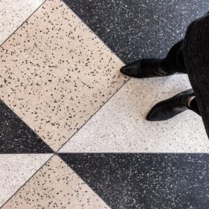 person on terrazzo flooring